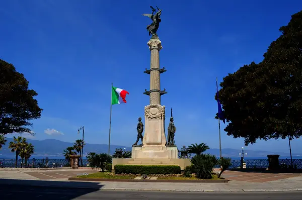 The Monument to the Fallen in Reggio Calabria, featuring Winged Victory and bronze statues on the seafront.