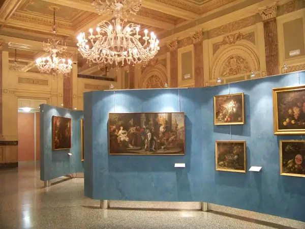 Interior view of the Civic Art Gallery of Reggio Calabria showcasing Renaissance and Baroque artworks.