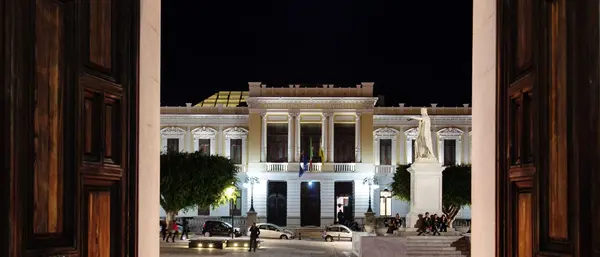 View of Palazzo Corrado Alvaro with Roman altar and historic artworks.