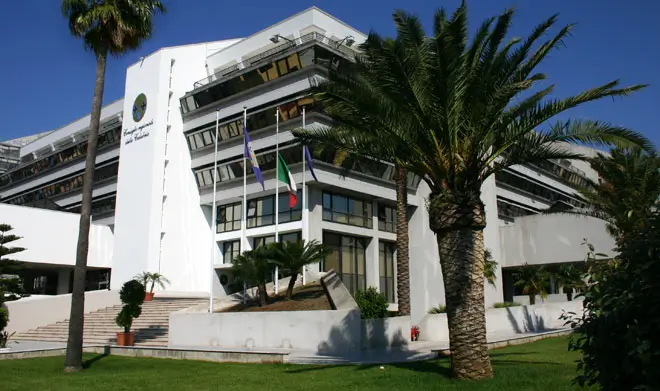 Futuristic façade of Palazzo Campanella with green garden views in central Reggio Calabria