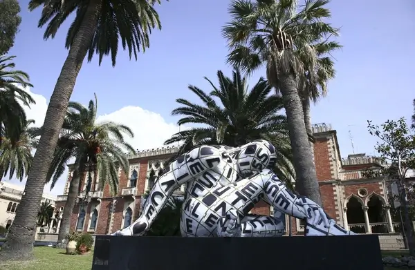 Bronze Rabarama sculptures, Trans-lettera by Rabarama, covered with black and white letters, on the Reggio Calabria seafront.